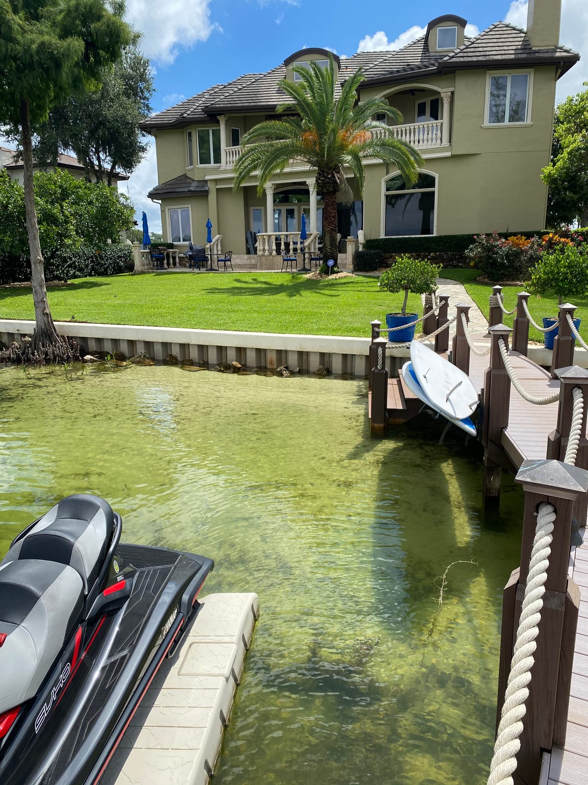 After — clear water at the lakefront dock
